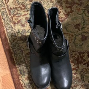 Black leather boots with silver studs